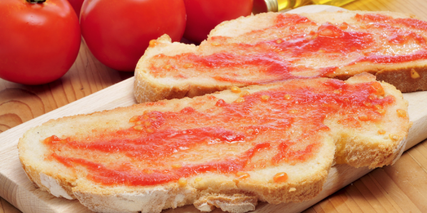 Conèixes l'origen del pà amb tomàquet?